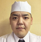 齊 直人